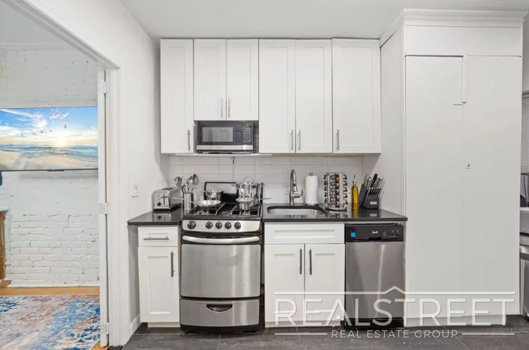 Building Photo - Modern 1BR/1BA in Prime Lower Manhattan | Fast Access to Midtown & Google HQ