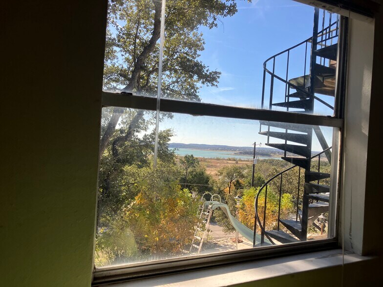 View Out of bedroom window with lake in the background - 1085 Arcadia Dr