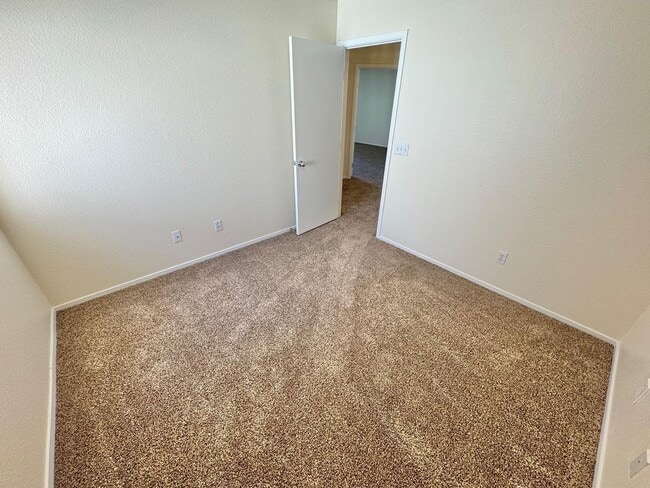 Building Photo - WELCOME TO THIS SPACIOUS 4-BEDROOM, 2.5-BA...