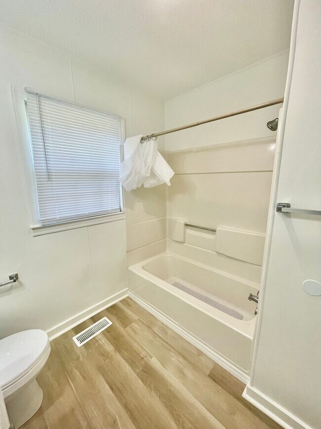 Building Photo - Newly renovated  3 bedroom 1 bath brick ranch home sitting on a large lot and on a quiet street i...