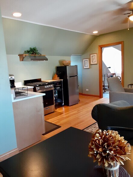View of kitchen and door to bedroom - 2422 N Drake Ave