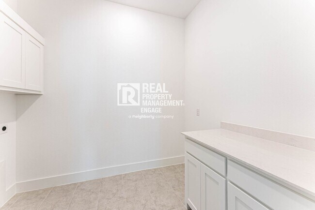Building Photo - Highly Upgraded Five-Bedroom Home Located ...