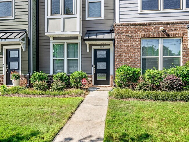 Building Photo - The Towns on Greenway! Two bedrooms. Two private baths, Half Bath. Greenway around the corner. Up...