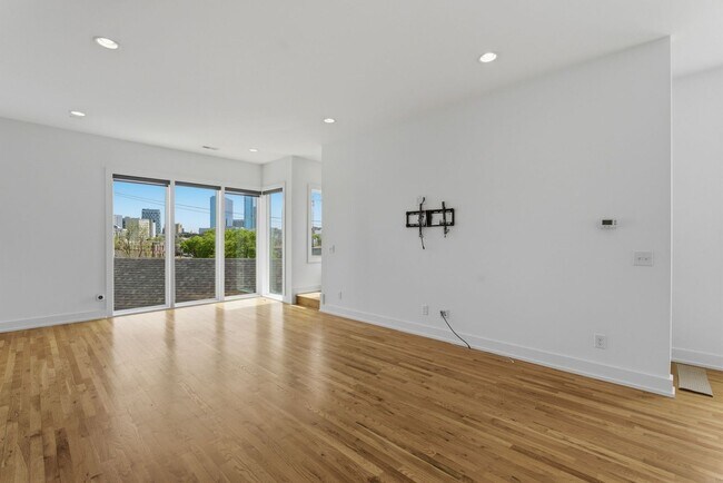 Building Photo - Beautiful 3-BR Property with Rooftop Deck!