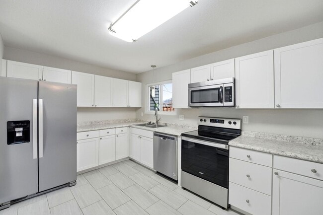 Building Photo - Updated 4BR Home with 2-Car Garage in Stratmoor