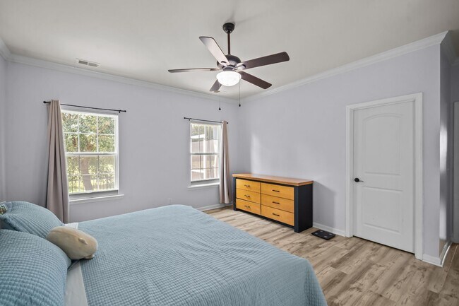 Building Photo - Relax by the Water – 4BR Home with Pond Views in Creekside