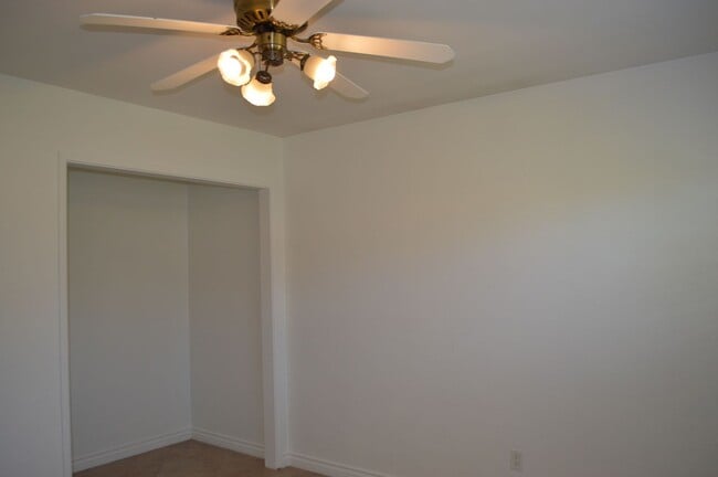 Building Photo - Four Bedroom, Two Bathroom Single Story Home With Two Car Garage