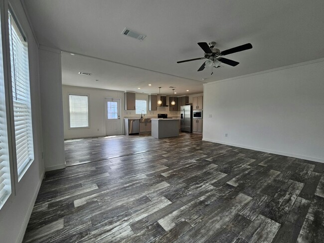 Building Photo - 6691 Hidden Oaks Dr