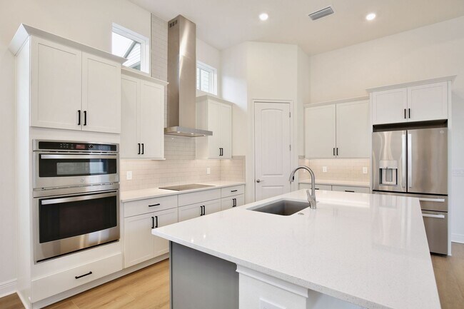 Building Photo - Gorgeous 4/3 Residence with a Private Back Lanai and a 2 Car Garage in the Delightful Laureate Pa...