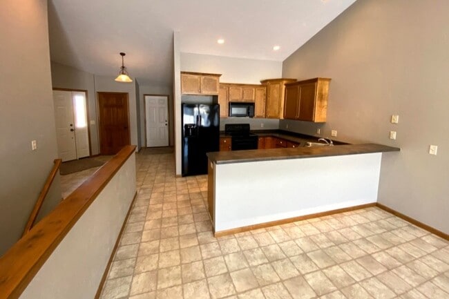 Kitchen with maple cabinetry - N1125 Craftsmen Ct