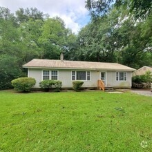 Building Photo - Spacious 3-Bedroom Home with Fireplace, an...
