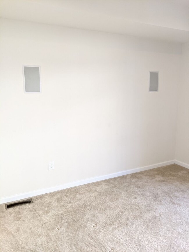 Building Photo - Bottom level (two story) *END UNIT* condo ...
