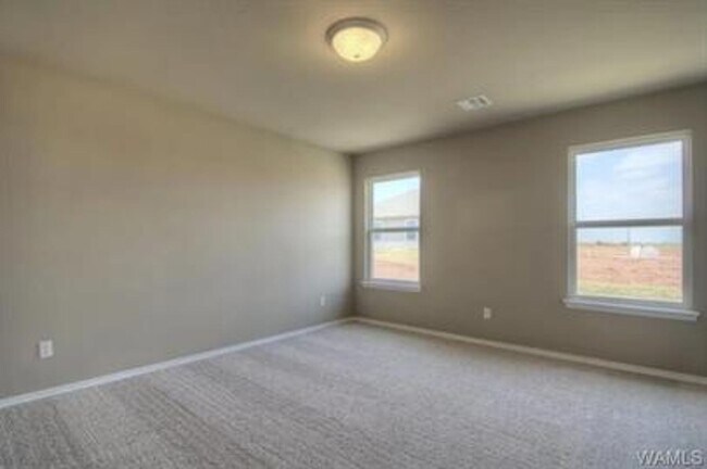 Building Photo - Stylish 4BR/2BA Home with Garage & Privacy Fence