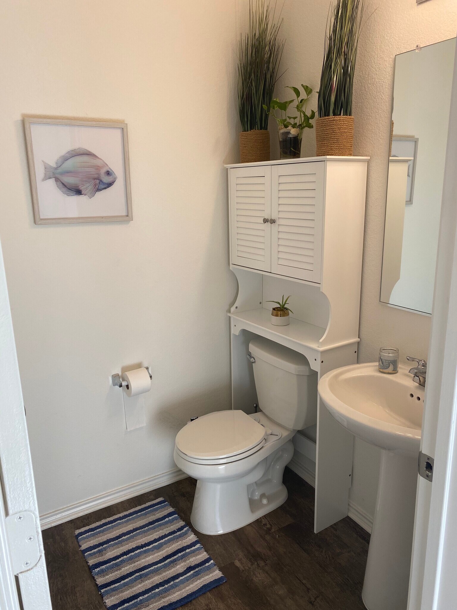 Half bath downstairs - 10406 Bramble Berry Dr