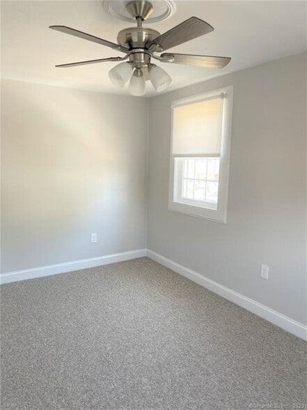 2 second floor bedrooms with overhead fans, carpet and custom shades - 10 Treadwell St