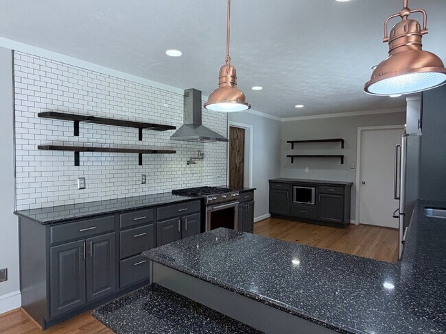 Building Photo - Updated 3BR Home in Beaver Lake | Fenced Yard, Garage, Covered Porch & Outdoor Fireplace | Pet Fr...