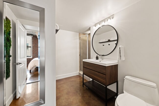 Building Photo - Fully Furnished Designer Loft with Parking & Monument Views!