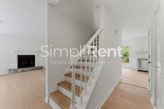 Building Photo - Updated Home with Spacious Layout & Private Backyard