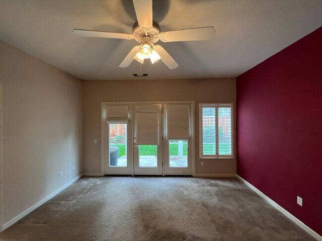 Building Photo - 4 bedrooms with 3 car garage in Rose Lane ...