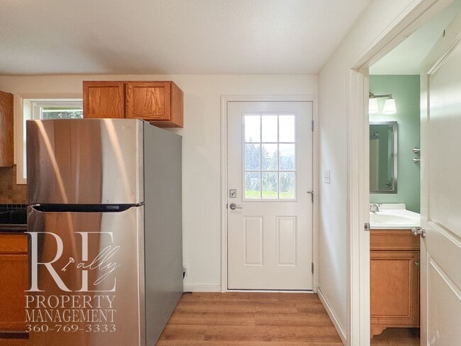 Building Photo - Private Retreat with Expansive Yard & Loft Space