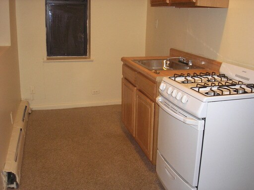 Building Photo - Quality Urban Properties