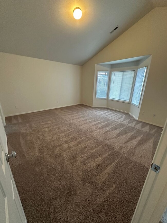 Building Photo - MOVE IN SPECIAL! Spacious 2 bed/2.5 bath with bonus room townhome off Road 68