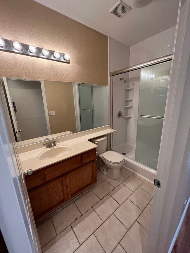 Building Photo - 3 Bed| 2 Bath | 1243 SF | 2 Car Garage | Single Story | Tenant pays $175 monthly for WS&G