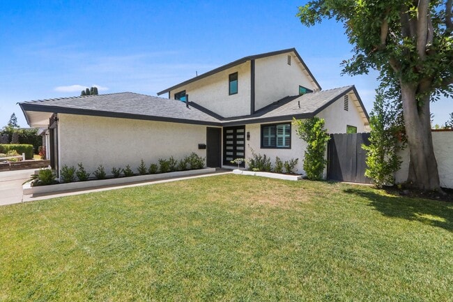 Building Photo - Renovated Lake Forest Home with Expansive Yard & Modern Finishes