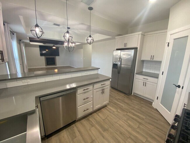 Building Photo - East El Paso 4 bed 2 bath Refrig A/C with gorgeous landscaping!