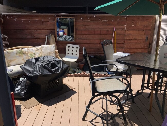Building Photo - Beautiful Townhome with large fenced back patio, second story balcony, and two covered parking spots