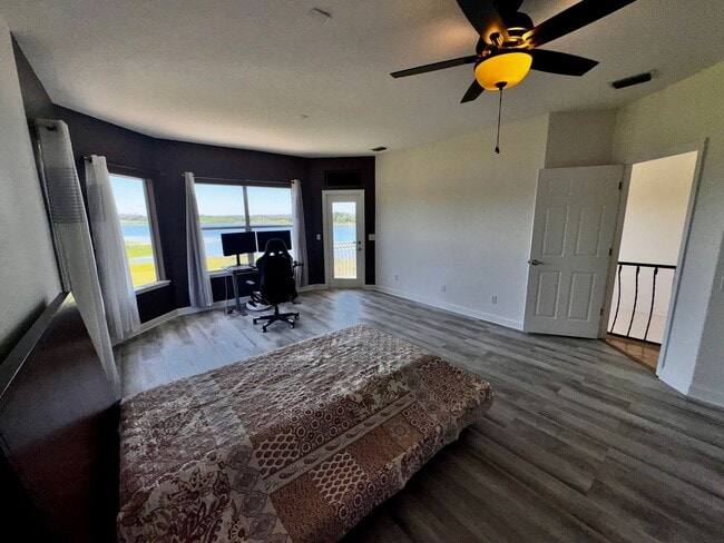 Building Photo - 3 Bedroom 2.5 Bath Cinnamon Bay Home with Stunning view, and Hardwood Flooring!