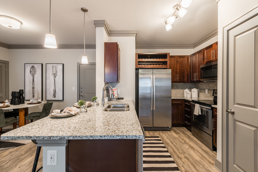 Modern kitchens with built in wine rack - Avalon Perimeter Park