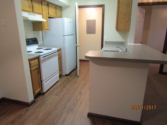 kitchen and laundry room - Arlington Village Apartments