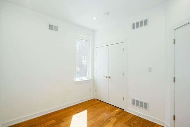 Building Photo - Stunning 4-Bedroom Townhouse with Garage and Rooftop Deck! Available late May!