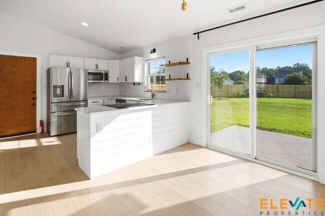 Building Photo - Beautiful Like-New 3 Bedroom Home with Huge Fenced Yard, Greenhouse & Storage