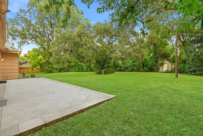 Building Photo - Charming Home with Expansive Backyard on a...