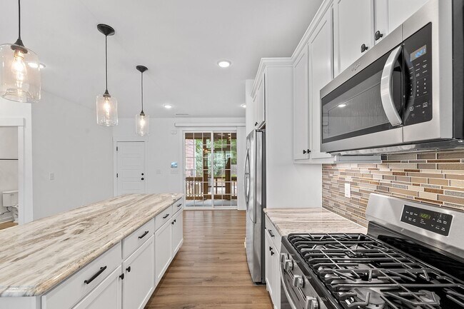 Building Photo - 3 Bedroom Townhome with Rooftop Terrace in Downtown Wake Forest!