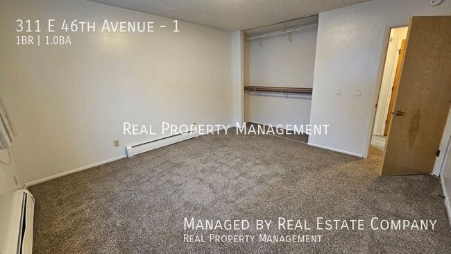 Building Photo - 311 E 46th Ave