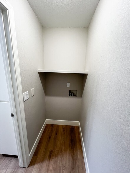 Washer and dryer room off kitchen. - 6521 W Lucky Ln