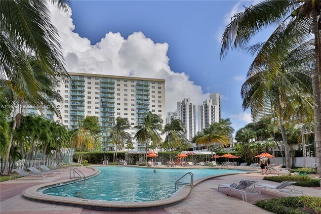 Building Photo - 19380 Collins Ave