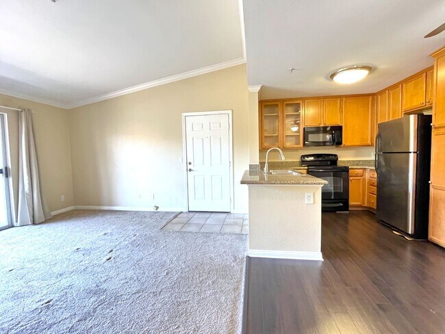 Building Photo - 1BR Condo with Private Balcony, Central A/C & Community Amenities in Corona