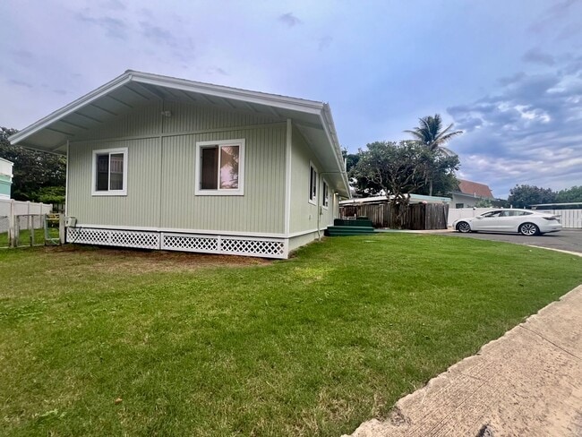 Building Photo - Beautiful, Bright & Airy Beach House--3Beds, 2Baths with Yard