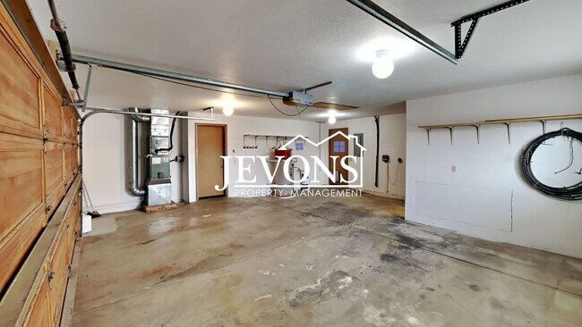 Building Photo - Enjoy this 3-bedroom home featuring a fully equipped kitchen, a two-car attached garage, and a fe...