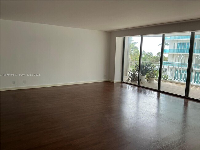 Building Photo - 10155 Collins Ave