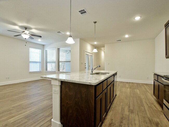 Building Photo - "Elegant 3-Bedroom Condo in Georgetown wit...