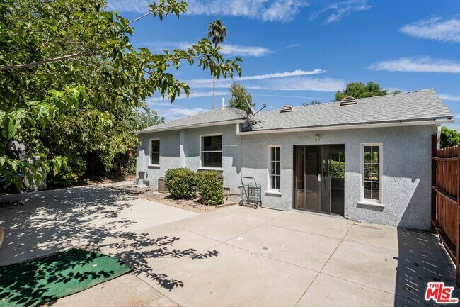 Building Photo - 8459 Calvin Ave