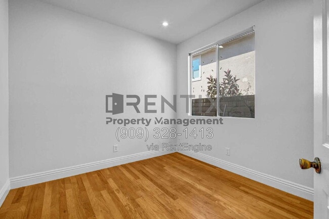 Building Photo - 6694 Cowboy St