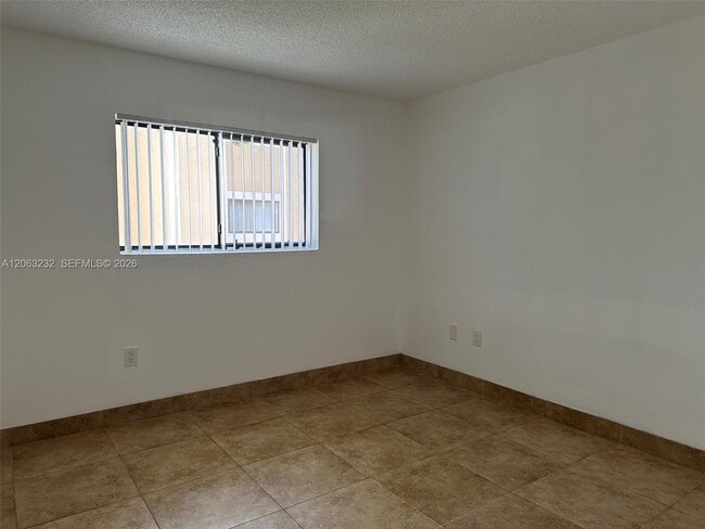 Building Photo - 9491 Palm Cir S
