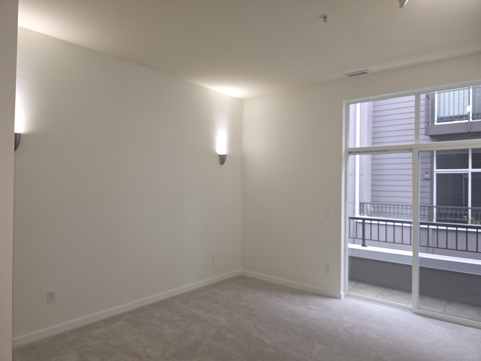 Spacious master bedroom with balcony - 521 7th Ave