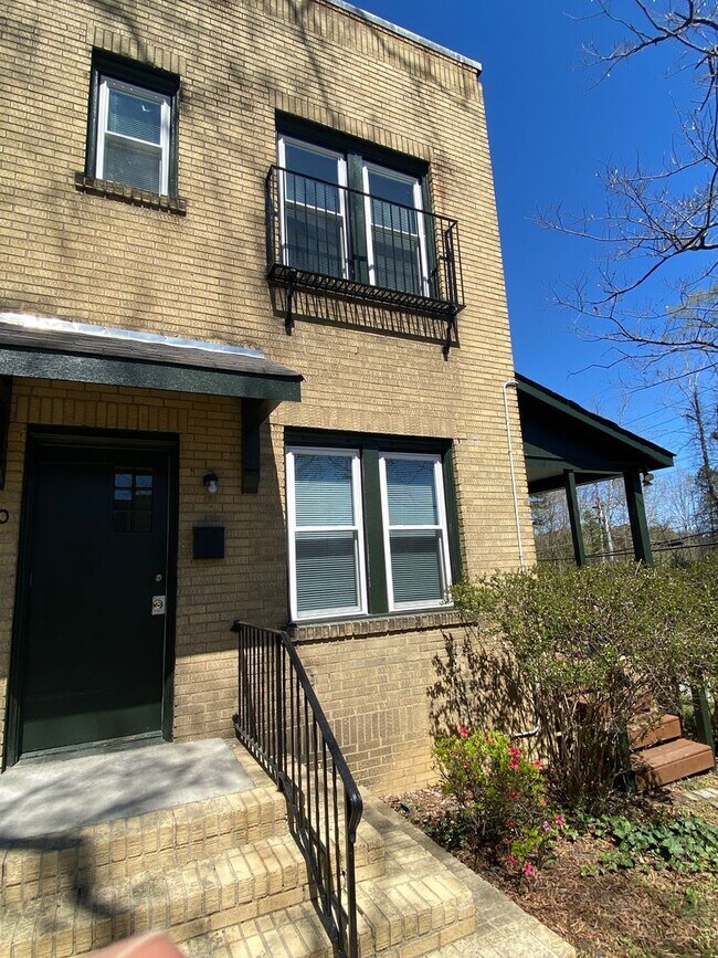 Building Photo - 1,550 square feet in Trinity Park. High ceilings, French doors, and a porch worth sitting on.